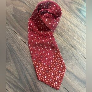 Ermenegildo Zegna Italian silk tie geometric designs red base luxe menswear